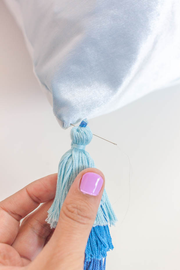 Adding tassels to pillow