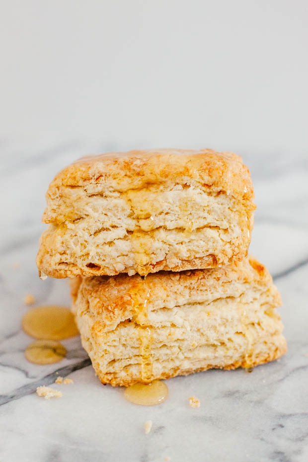 flaky biscuits dripping in honey